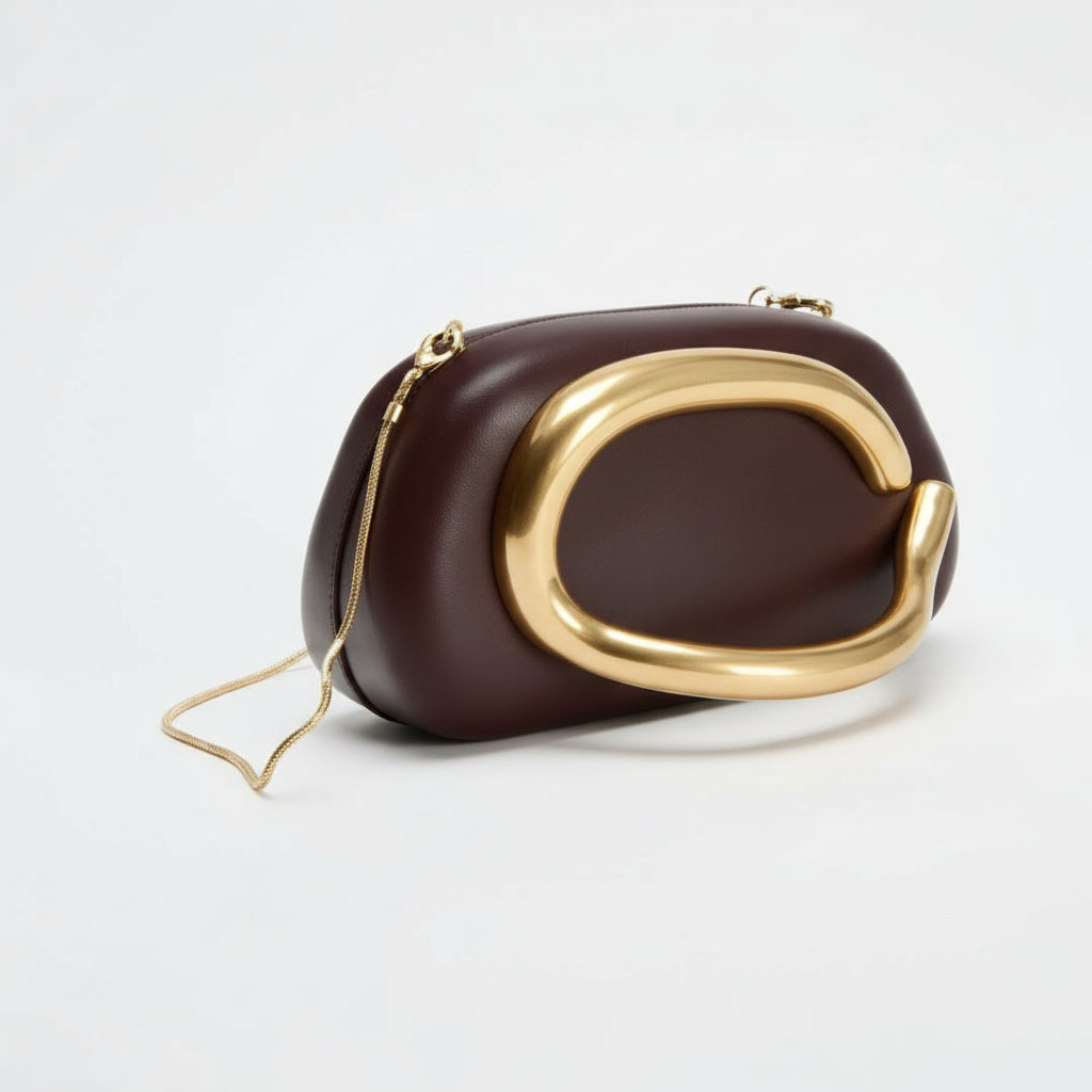 Ladie's Gold Metal Handle Clutch Bag